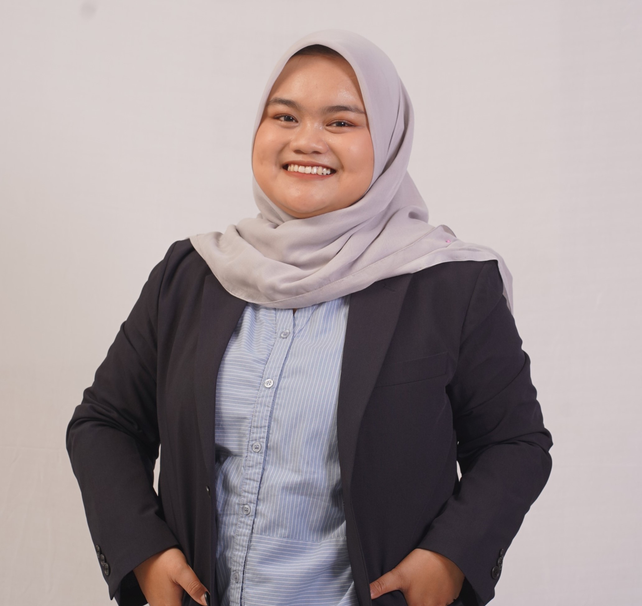 Restu Andini, S.Tr., Sos.